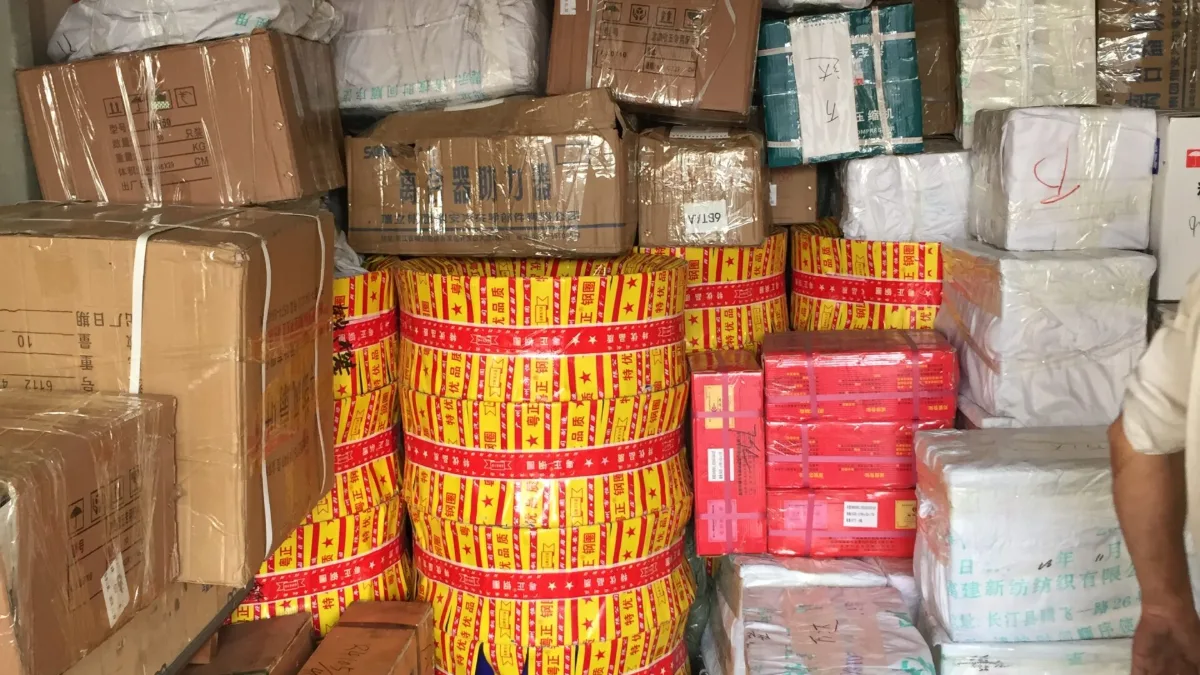 Auto parts cartons and wrapped tyres consolidated in one container