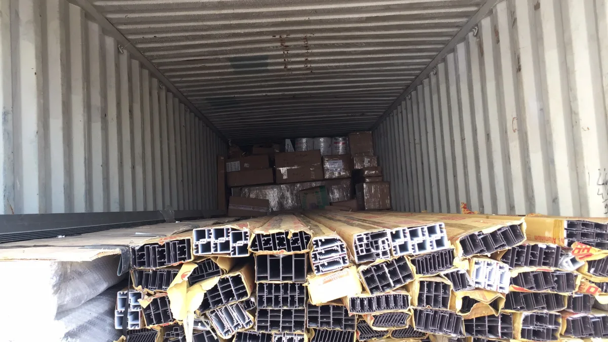 Bundles of metal profiles loaded in a shipping container