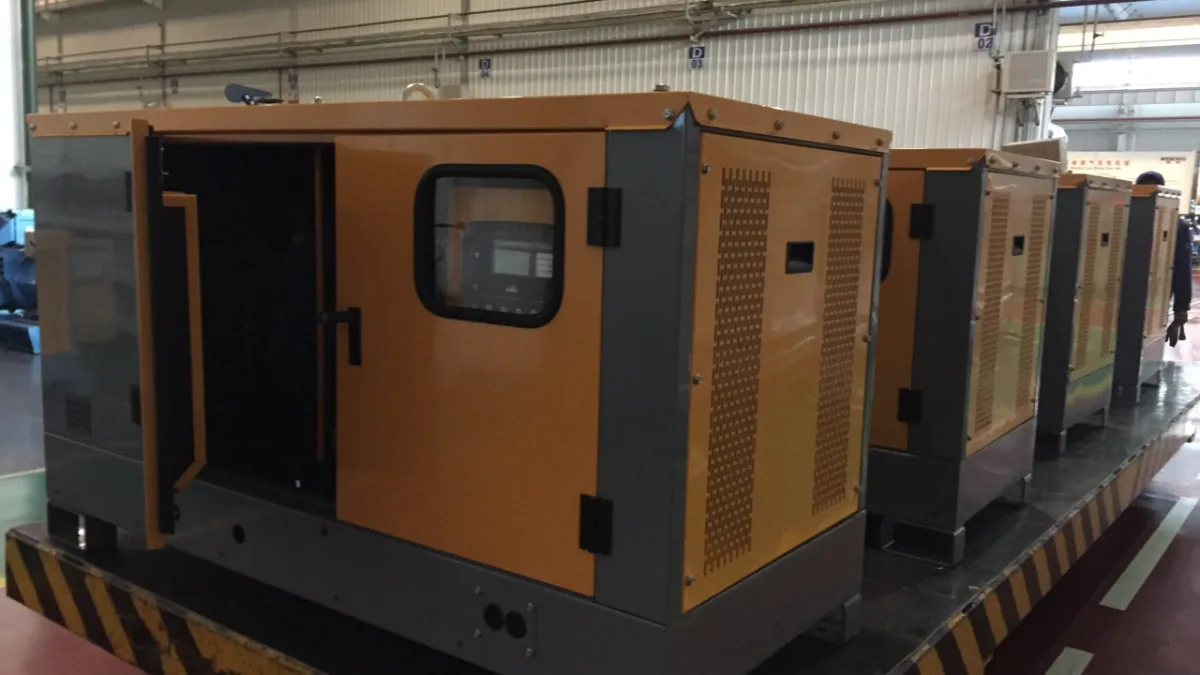 Silent diesel generator sets lined up in a factory before shipment