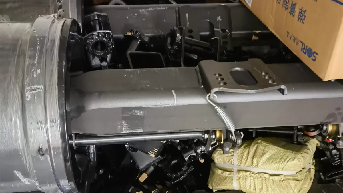 Truck axles and auto parts packed in a container